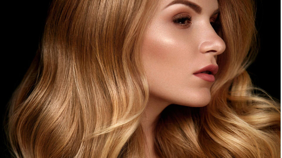 woman with sleek blonde wavy hair