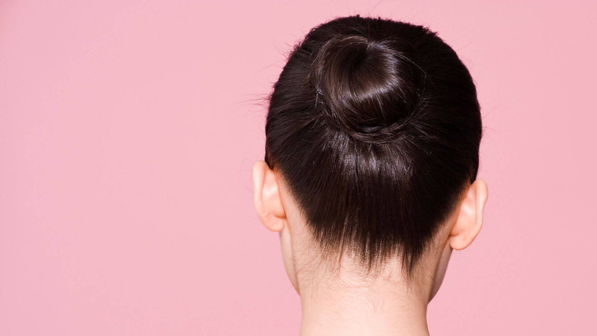woman with slick back bun