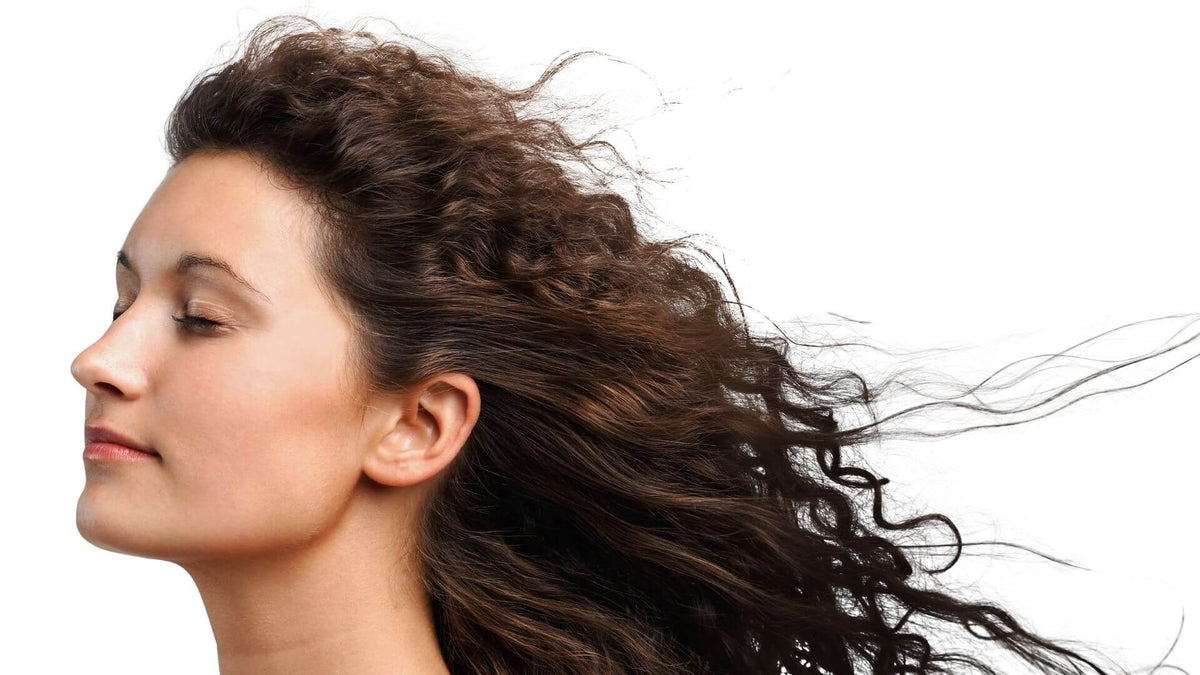 woman with curly hair white background