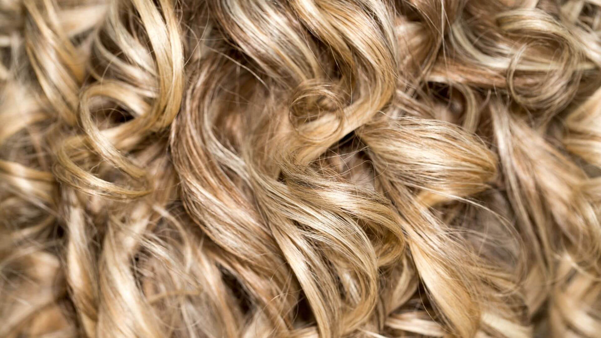 curly blonde hair