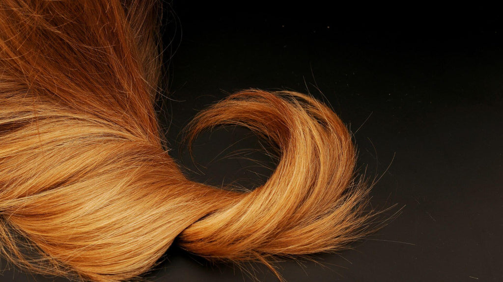 red hair on black background