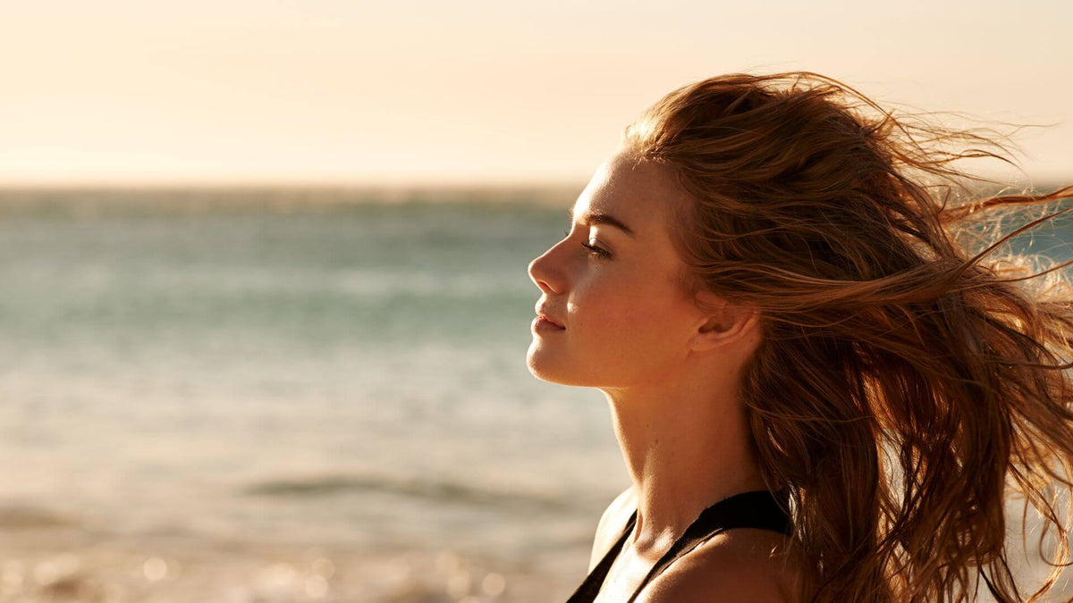 brunette woman at beach