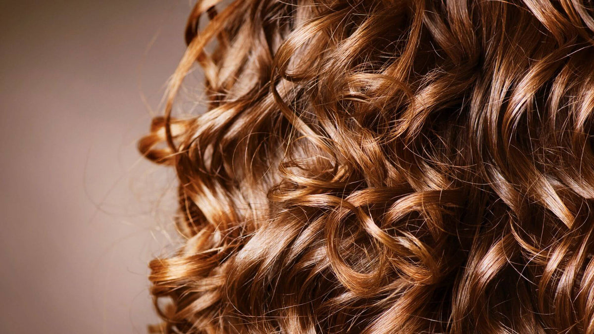 curly brunette hair