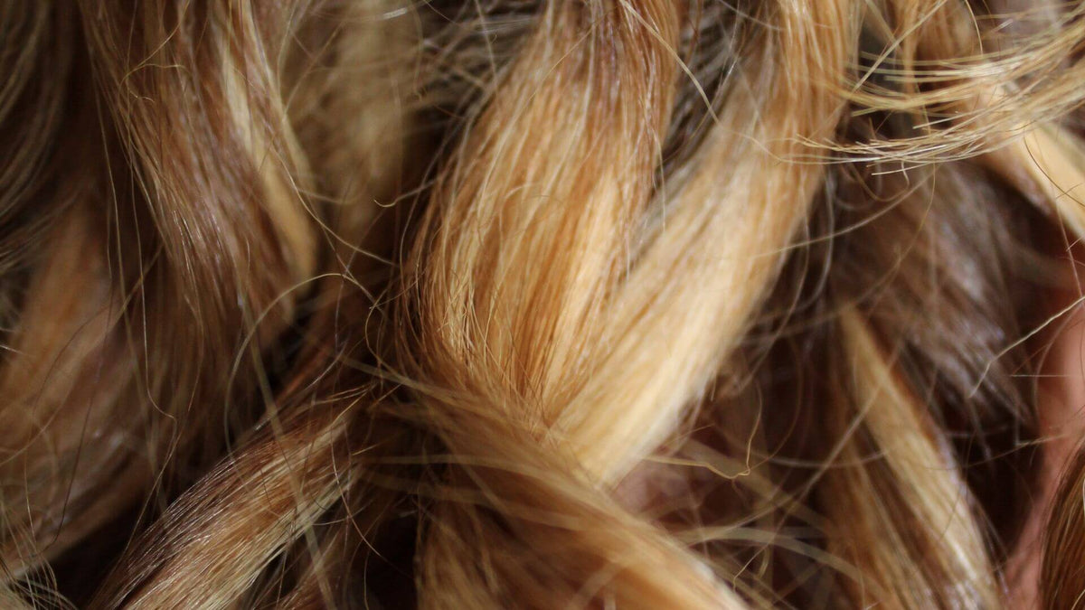 blonde wavy curled hair close up