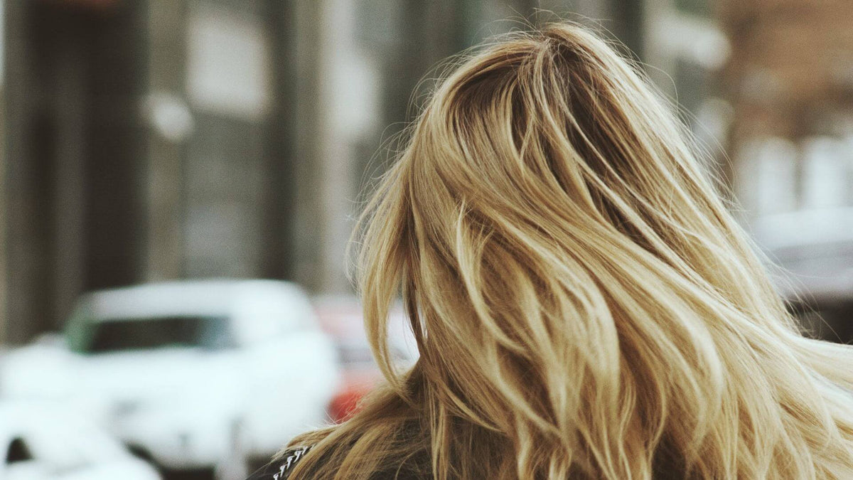 blonde woman back of head