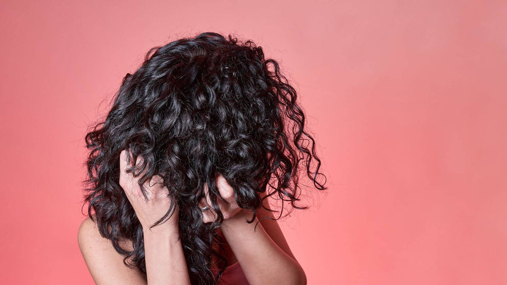 brunette hair pink background