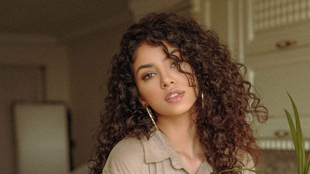 woman with curly brown hair