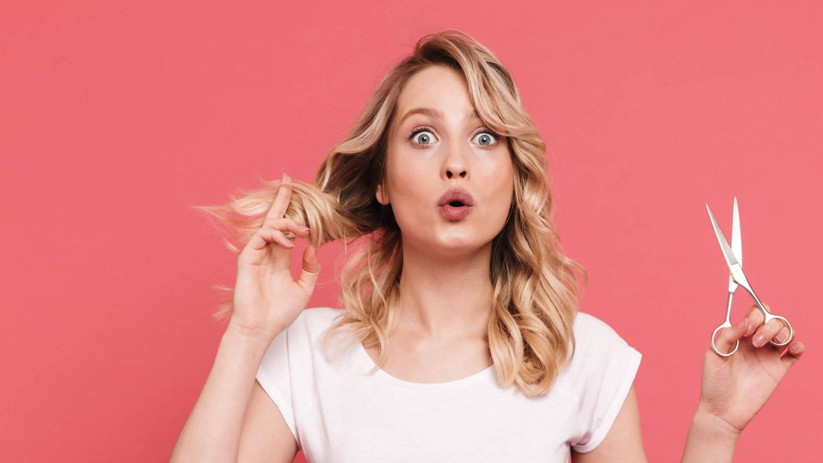 woman pink background blonde hair
