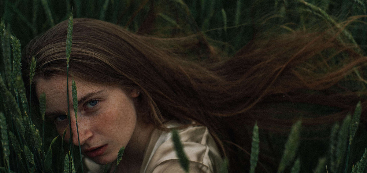 woman hair in grass