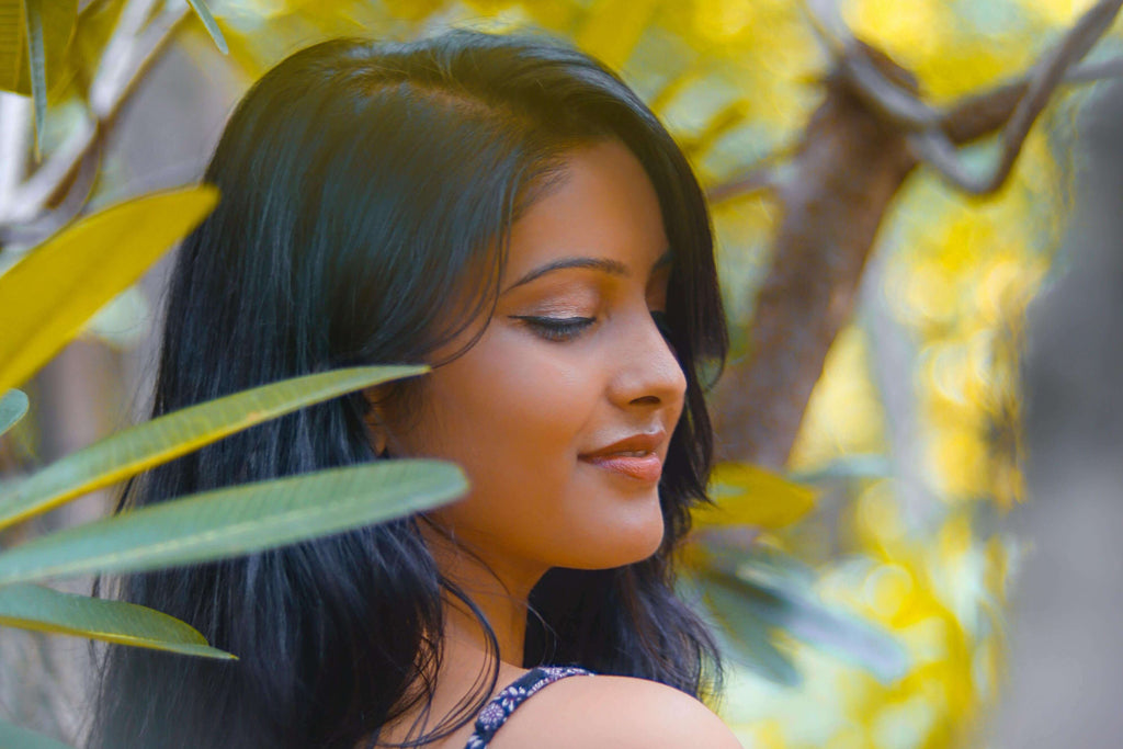 brunette hair woman in tree