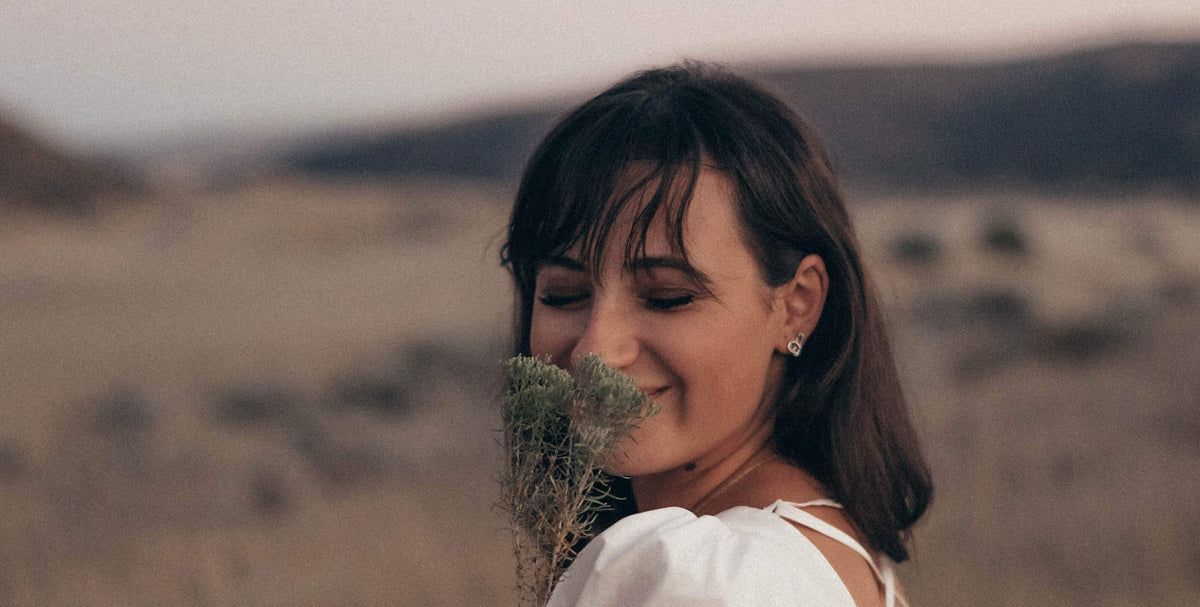 short brunette hair woman in field