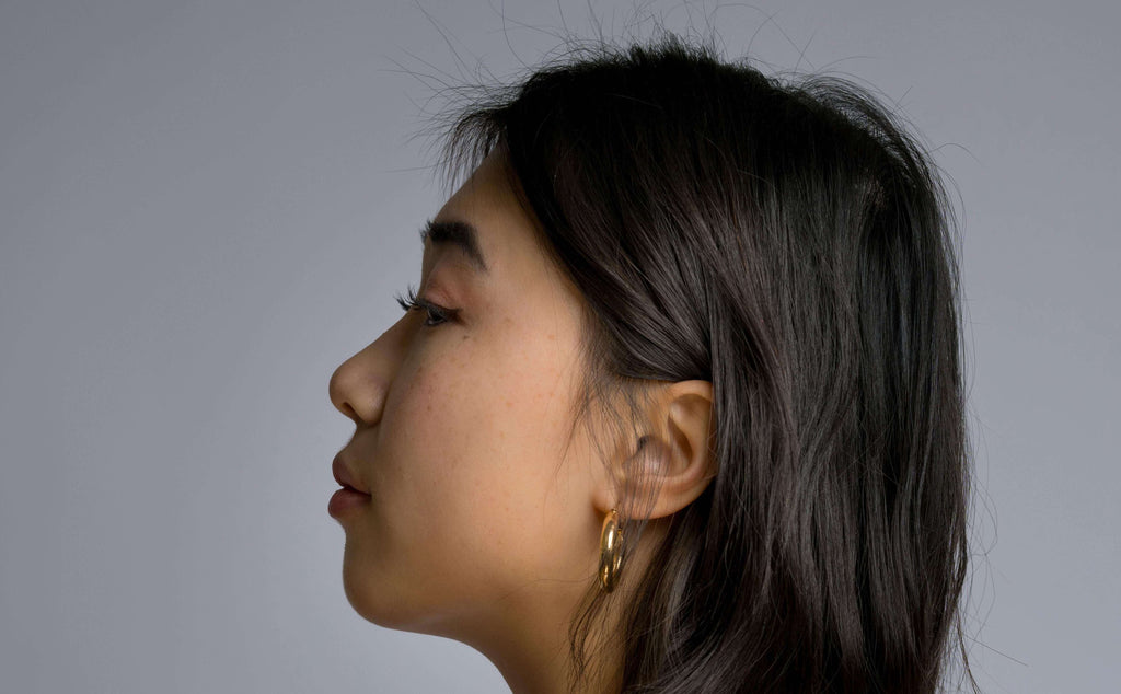 woman with short hair profile view