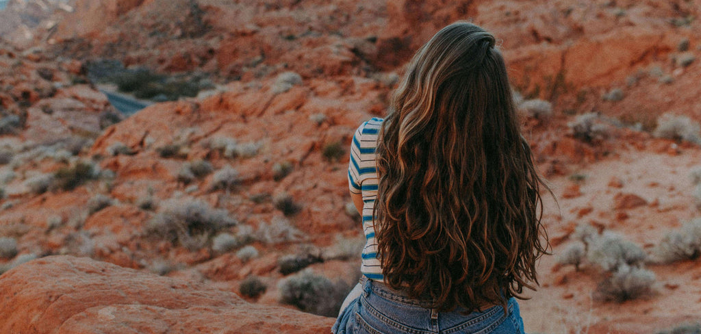 woman with long hair in the desert