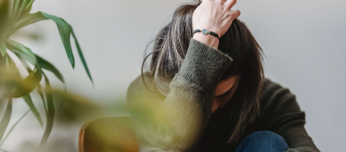 woman with hand in her hair